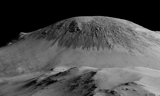 Satellite images have identified narrow streaks that appear on slopes during warm seasons, lengthen, and then fade when conditions become cooler. Photograph: Nasa/JPL/University of Arizona/PA